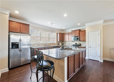 Kitchen featuring appliances with stainless steel 