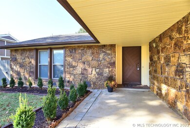 Welcome guests on this oversized front porch.