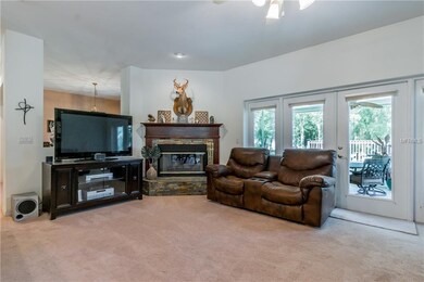 wood burning fireplace with slate tile and wood ma