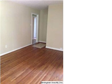 Living room with Hardwoods