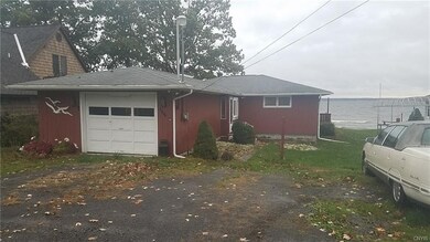 Front Exterior with 3 garage spaces Could be 4 if 