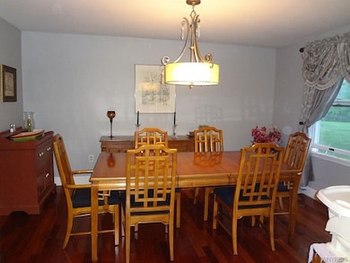 Dining room with cherry floors also