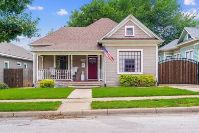 View of front of house featuring covered porch and