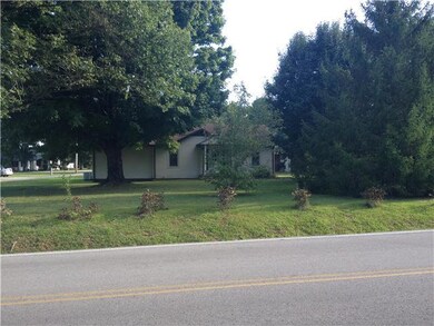 Another street view of gorgeous corner lot