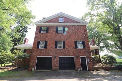 2 Integral garages with Man Door. Small stairway t