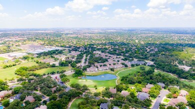 Aerial view of property's location with a large b