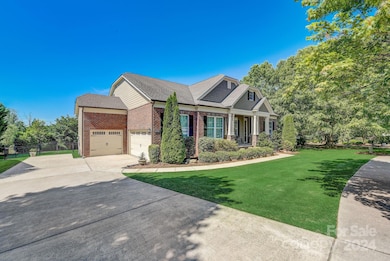 3 car garage with extended driveway for guests