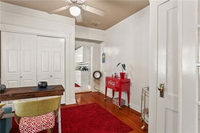 Dining Room: wood floors...ceiling fans and closet