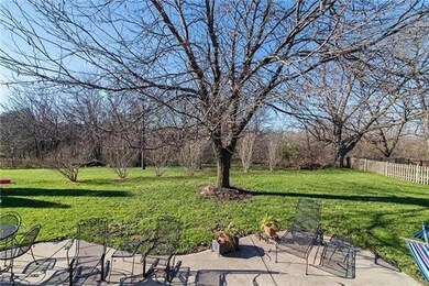 Beautiful patio with nice yard that meets greenspa
