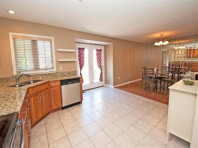 Kitchen open to Dining Room and Outside Deck
