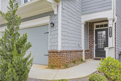 Entrance to property with brick siding