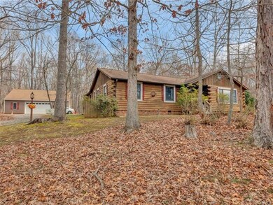 View of home and detached garage.