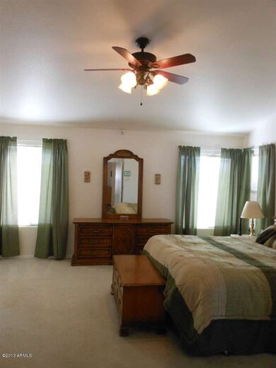 master bedroom showing beautiful fan