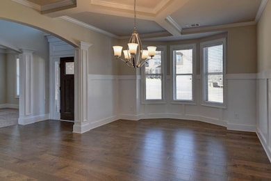 Unfurnished dining area featuring an inviting chan
