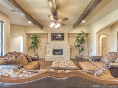 Impressive beams anchor the living room.  Wired fo