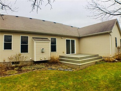 Classic patio block surrounds this tastefully cons