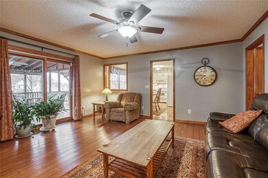 Sliding door to porch and fenced backyard