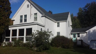Nicely landscaped and sun/room on...