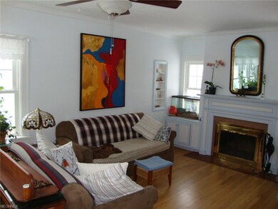 Hardwood Floors, Wood Burning Fireplace, and Custom Built-In Cabinets.