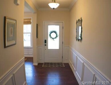 Main level enter the foyer to find #hardwood floor