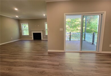 ffamily room area with gas fireplace and walk-out