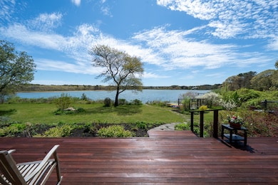 Gorgeous views from the deck to the waterfront and staircase to the water.