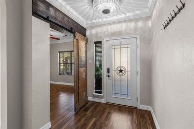 Entry and study with upgraded barn door.