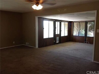 Living Room Adjacent To Sunroom