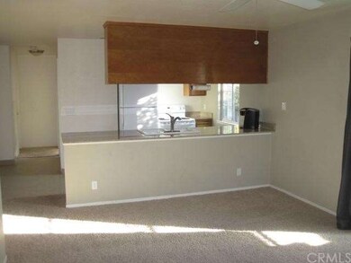 Living room looking into the kitchen