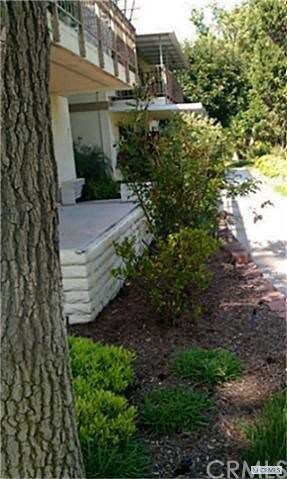 sidewalk which is in front of residence trailing a