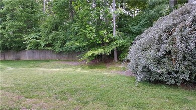 Back yard.  Privacy fence across the back and down