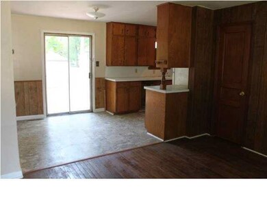 Dining Room is 8.6 x 7.9 with vinyl flooring and a