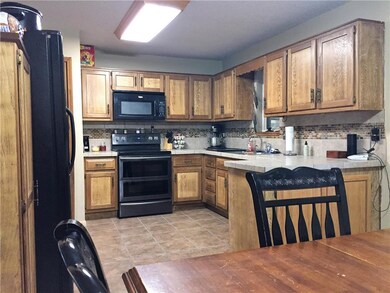 Tiled floor in Kitchen plus lots of cabinet storag