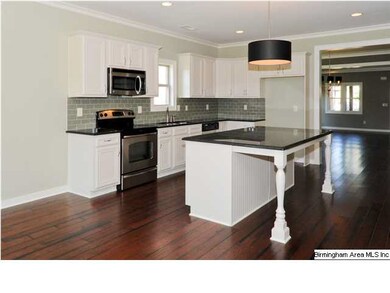 GREAT kitchen with granite counters, tile backspla