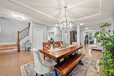 Dining space with light hardwood / wood-style floo