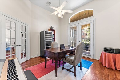 Study off of the entryway with french doors leadin