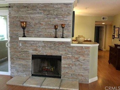 Fire Place With Dining Room and Hallway Toward Rig