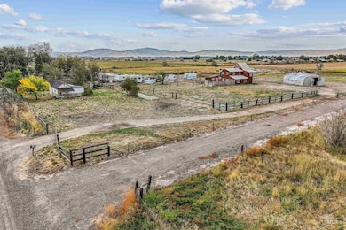 Overview of rural landscape featuring a mountain backdrop
