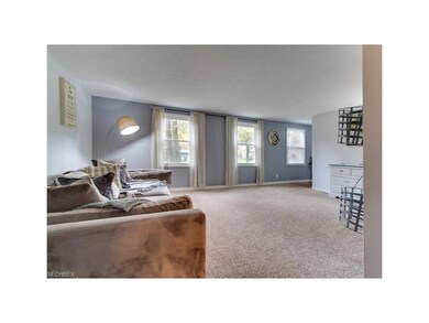 spacious living room with new flooring and newer w