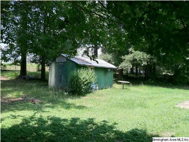 Large level fenced backyard.  This tool shed remai