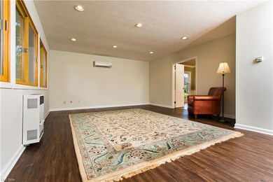 Large Family Room features Large Sliding Marvin Wi