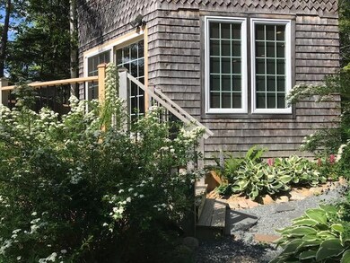 Garden path to deck & entry.