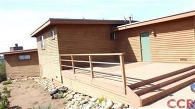 Spacious deck off the rear of the garage with sepe