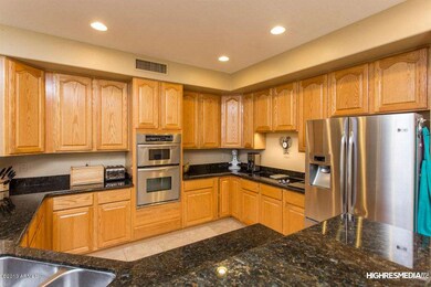 Granite counters, travertine floors
