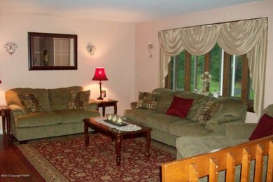 Spacious Living Room with Bay Window