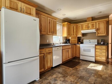 New windows and custom blinds at all windows, too!