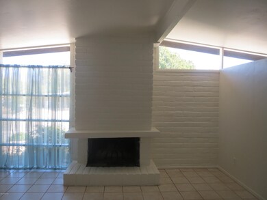 Living Room With Wood Burning Fireplace