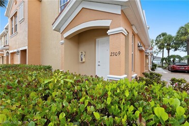 Entrance to property featuring stucco siding