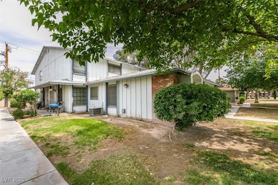 View of front of home featuring central AC and a p