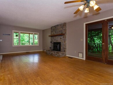 Living room leading out to side covered porch